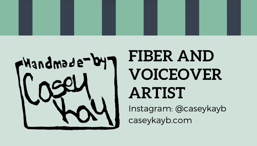 A business card with light green background and a top border of alternating blue and green. There is a hand-carved logo on the left with a bounding square that says, "Handmade by Casey Kay." The right has a headline that says, "Fiber and Voiceover Artist," and the contact information says, "Instagram: @caseykayb caseykayb.com."